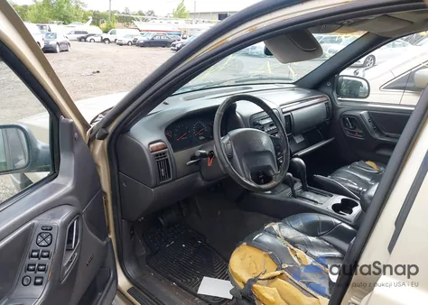 2000 Jeep Grand Cherokee Laredo из США, поврежденный, VIN 1J4GW48S3YC347711